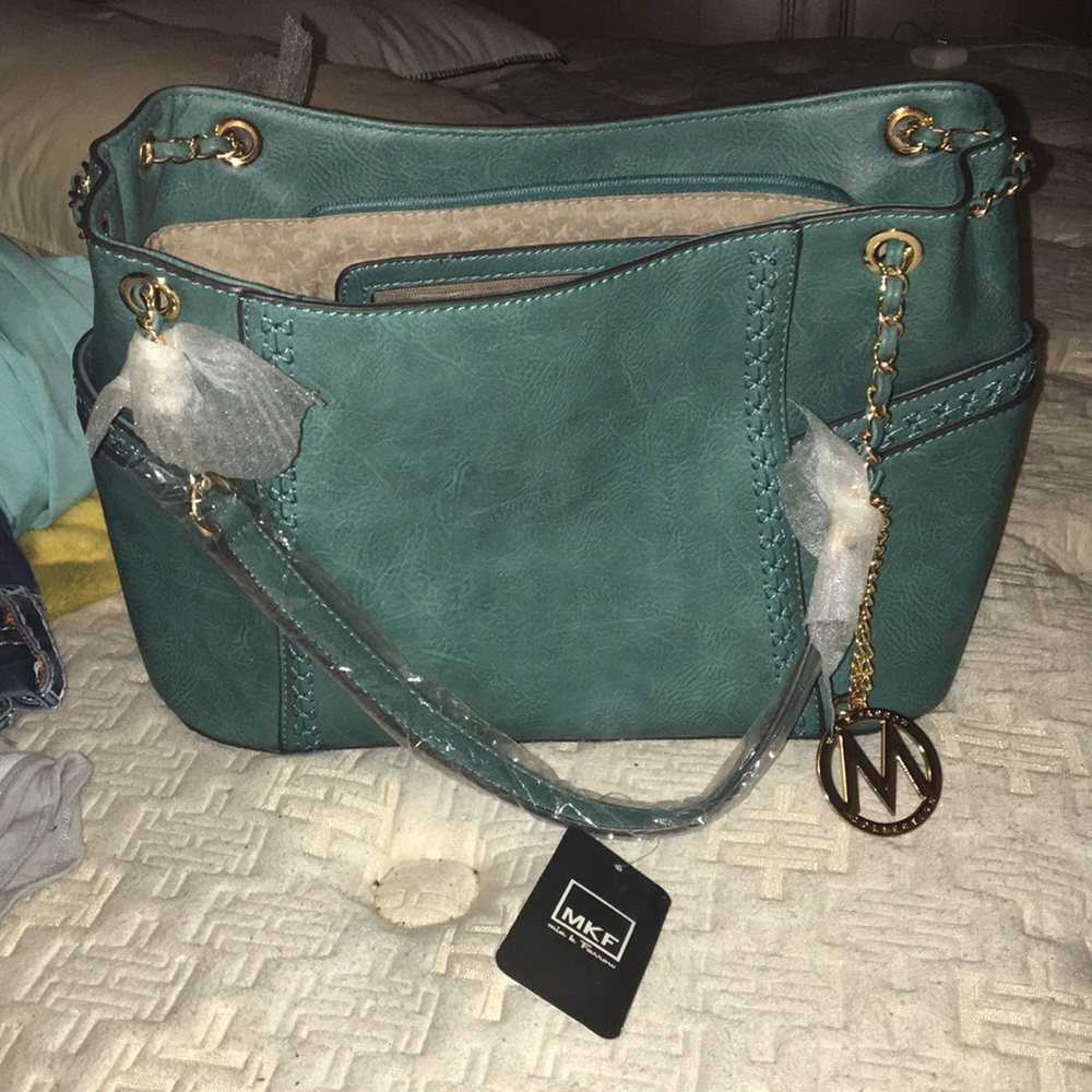 mia k Farrow Teal purse